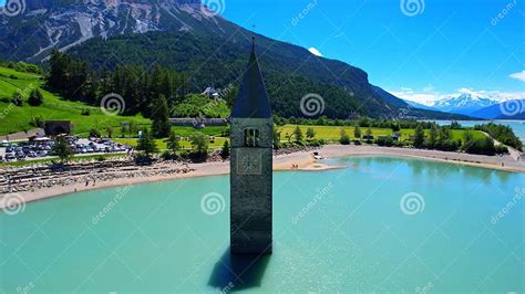 Church Tower in Lake Reschen - South Tyrol - Italy - 4k Drone Photo Stock Image - Image of ...