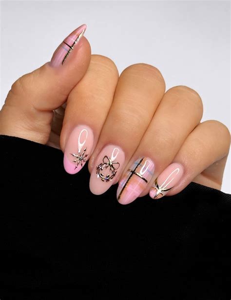 Winter Wonders Festive Christmas Nail Art Designs Light Pink Plaid