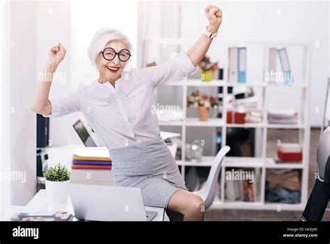 Glad Happy Business Lady Expressing Joy At The Workplace Stock Photo