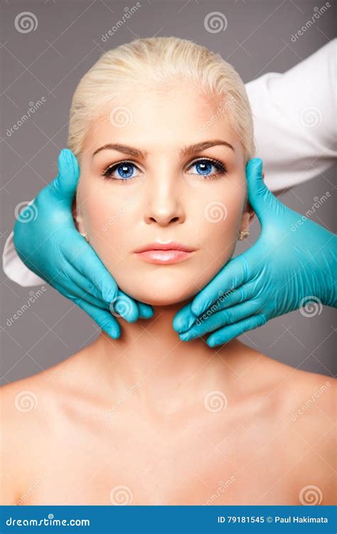 Cosmetic Plastic Surgeon Touching Aesthetics Face Stock Photography