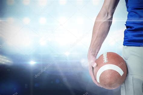 Sports player holding ball — Stock Photo © Wavebreakmedia #88041946