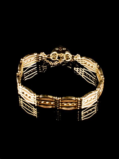 9ct Gold Four Bar Gate Bracelet With Padlock Goodwins Antiquesgoodwins Antiques