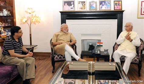 Narendra Modi calls on Advani at his house