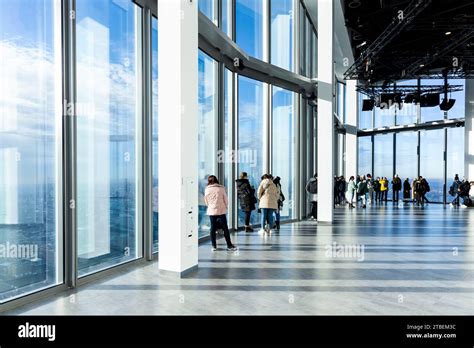 People Looking At The City Skyline From Horizon 22 Viewing Platform In