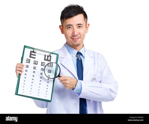 Optician Doctor With Eye Chart And Magnificent Glasses Stock Photo Alamy