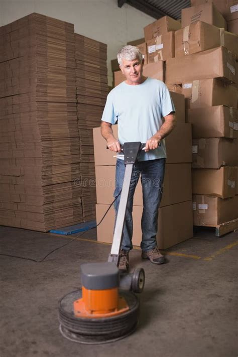 Man Cleaning Warehouse Floor with Machine Stock Image - Image of mature ...