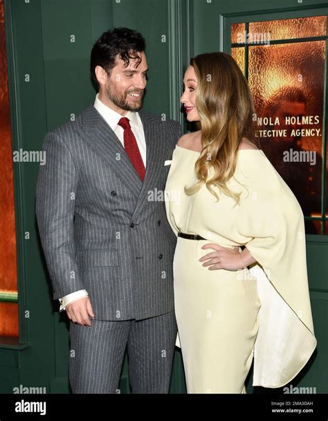 Actor Henry Cavill Left And Girlfriend Natalie Viscuso Attend The