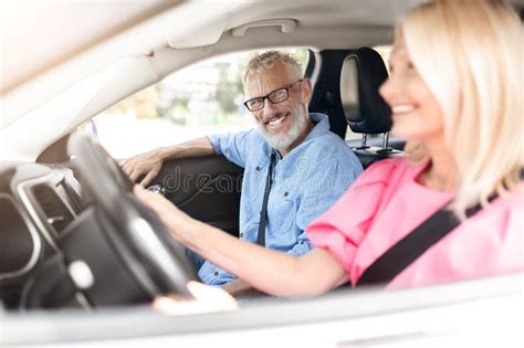 Retired Wife Driving With Husband In Passenger Seat Stock Image Image