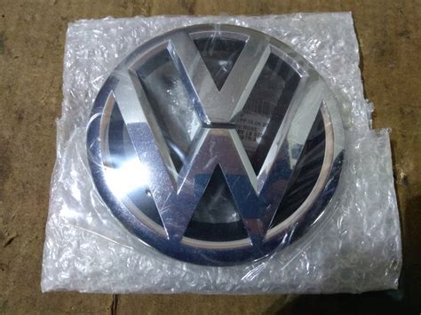 VW PASSAT TIGUAN EMBLEMAT ZNACZEK LOGO 561853600 7720938579