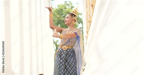 Beautiful Asian Woman In Thai Traditional Dress Dancing Traditional Thai Dance In Thai Buddhist