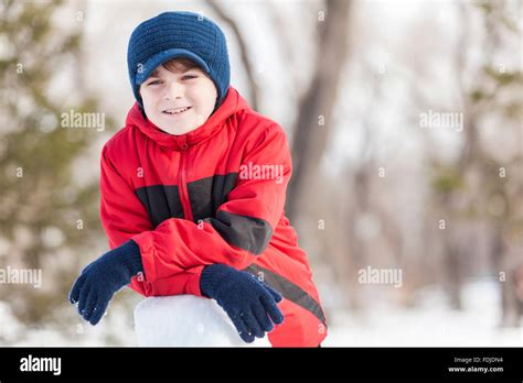 Little Cute Boy Having Fun In Winter Park Stock Photo Alamy