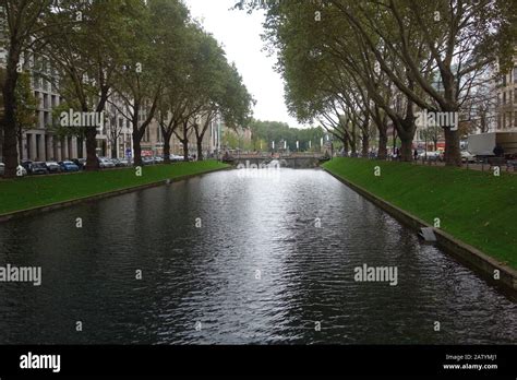 A stretch of the green landscaped canal of the Konigsallee in ...