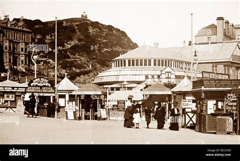 Pier Entrance Llandudno Showing The Camera Obscura On The Hill Early