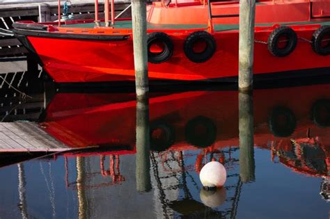 Premium Photo Boats Moored In Lake