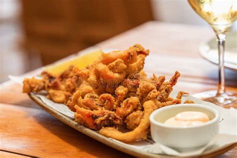 Mixed Fried Seafood With Shrimp Squid And Baby Octopus And Sauce