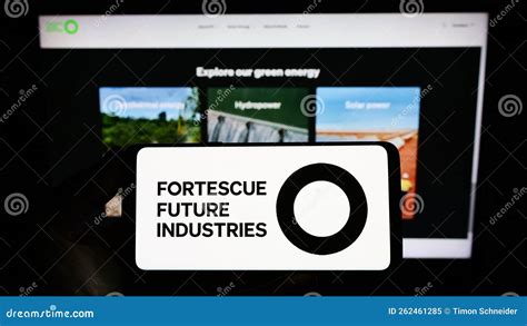 Person Holding Smartphone With Logo Of Energy Company Fortescue Future