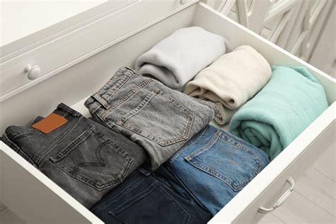 Folded Clothes in Drawer. Apparel Storage Stock Image - Image of ...