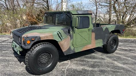 2009 AM General Humvee at Indy 2023 as L172 - Mecum Auctions