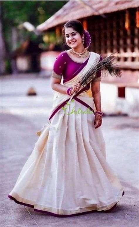 Traditional Kerala Gold Kasavu Tissue Dhavani With Purple Blouse