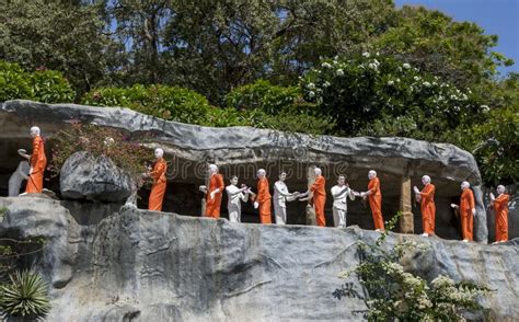 A Line Of Buddhist Monk Statues At The Golden Temple At Dambulla Sri