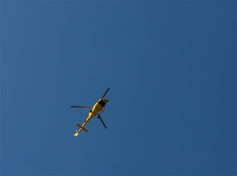 Free Image: Yellow helicopter against the blue sky | Libreshot Public ...