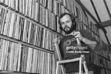 Radio disc jockey John Peel pictured at home with his record... News ...