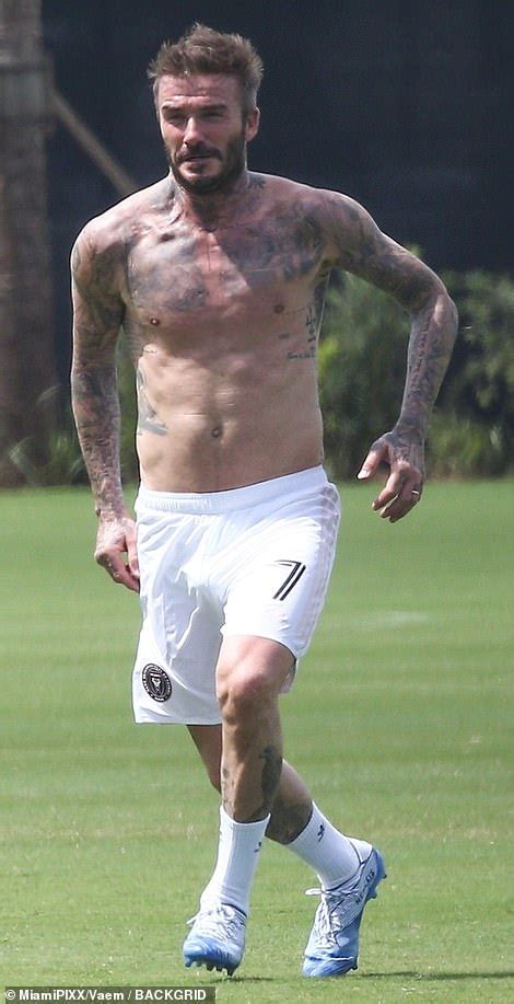 David Beckham Displays His Hunky Tattooed Torso As He Goes Shirtless For A Game Of Football