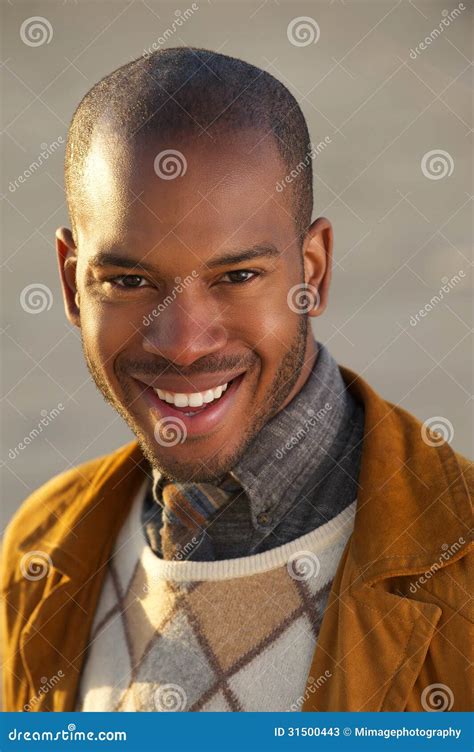 Portrait Of An Attractive Young African American Man Smiling Outdoors