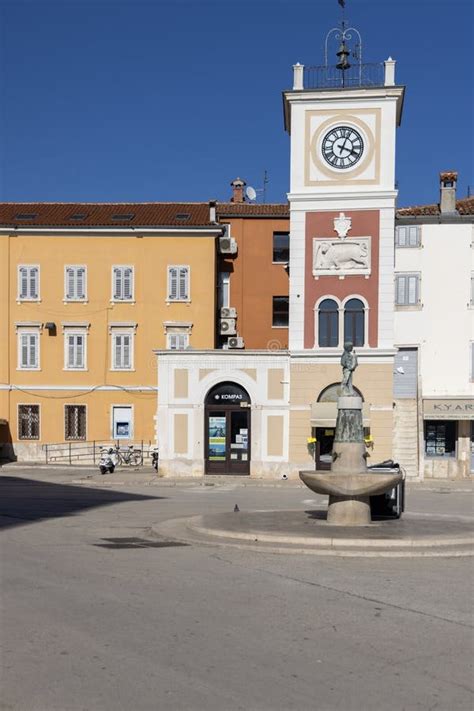 Boy With Fish Fountain On Marshal Tito Square In Front Of Tower With