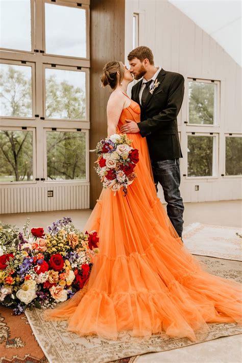 A Retro 70s Inspired Shoot With Wildflowers A Rad Orange Wedding