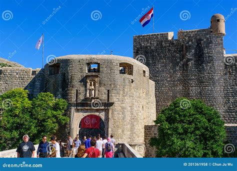 People Walking Through Pile Gate The Main Entrance To The Old Town Of