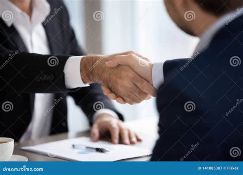 Closeup View Of Male Hands Shaking At Meeting Making Deal Stock Image