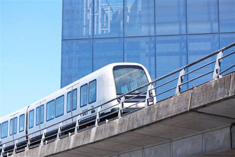 Sustainable Driverless Modern Light Rail Metro Train On Railroad Track