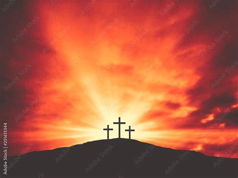 Three Christian Good Friday Crosses Silhouette On Hill Of Calvary With