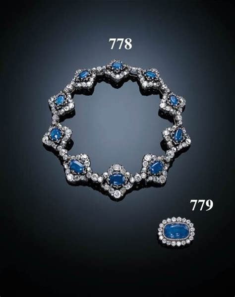 AN ATTRACTIVE ANTIQUE SAPPHIRE AND DIAMOND NECKLACE BY BIEDERMANN