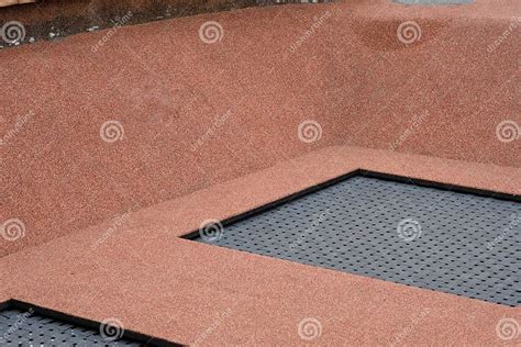 Playground With Trampolines And Rubber Crumb Coating Stock Photo