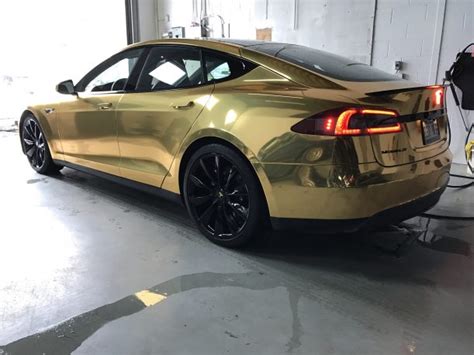 This chrome-gold Tesla Model S is glaringly gaudy - Drone Rush