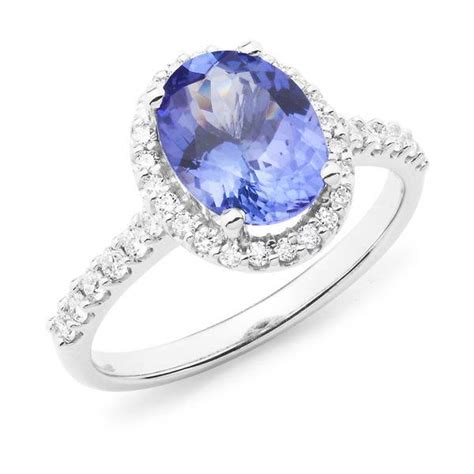 Oval Tanzanite And Diamond Halo Ring Andrew Mazzone