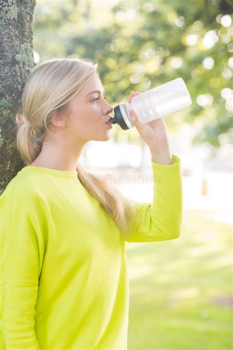 Fit Calm Blonde Drinking From Water Bottle Stock Image Image Of Long