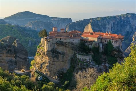 Premium Photo | Monasteries of meteora at sunset greece