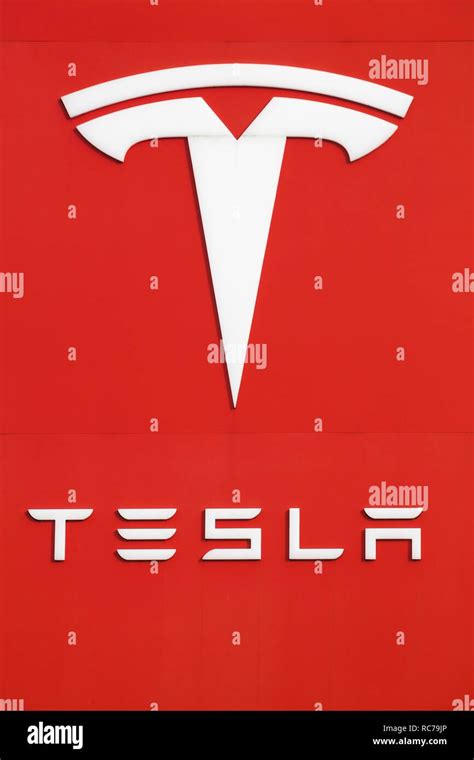 Tilst, Denmark - October 7, 2018: Tesla logo on a wall. Tesla is an ...