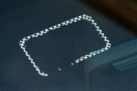 how to remove sticker residue from car window