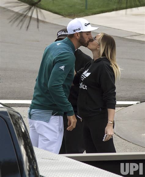 Photo Dustin Johnson Kisses Paulina Gretzky At The Masters