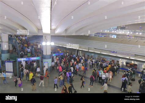 People travel at Rajiv Chowk metro station New Delhi India Stock Photo ...