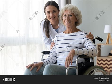 Caring Nurse Hug Image And Photo Free Trial Bigstock