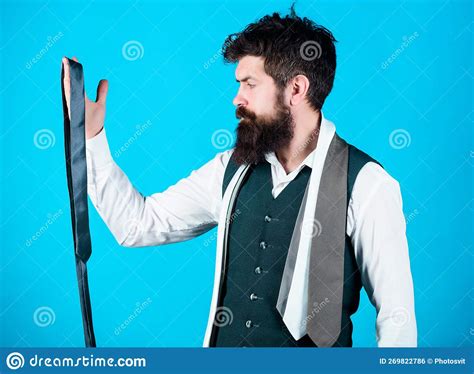 Guy With Beard Choosing Necktie Gentlemens Guide How To Choose Right