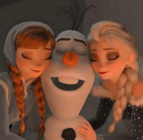 Two Girls Are Hugging A Snowman In Front Of The Camera With Their Eyes