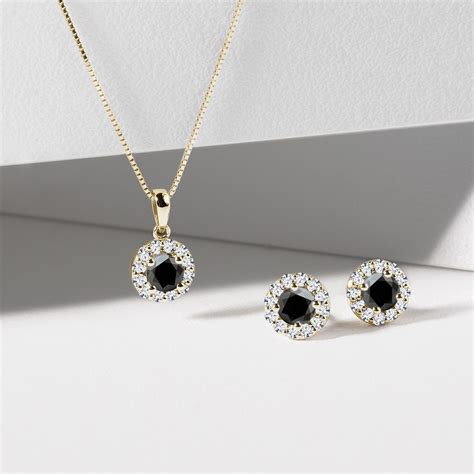 Black diamond jewelry set in yellow gold | KLENOTA