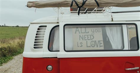 Volkswagen Van with a Placard on the Window · Free Stock Photo