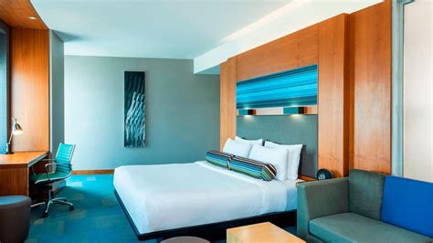 aloft abu dhabi family friendly hotel   rooftop kitchen bar